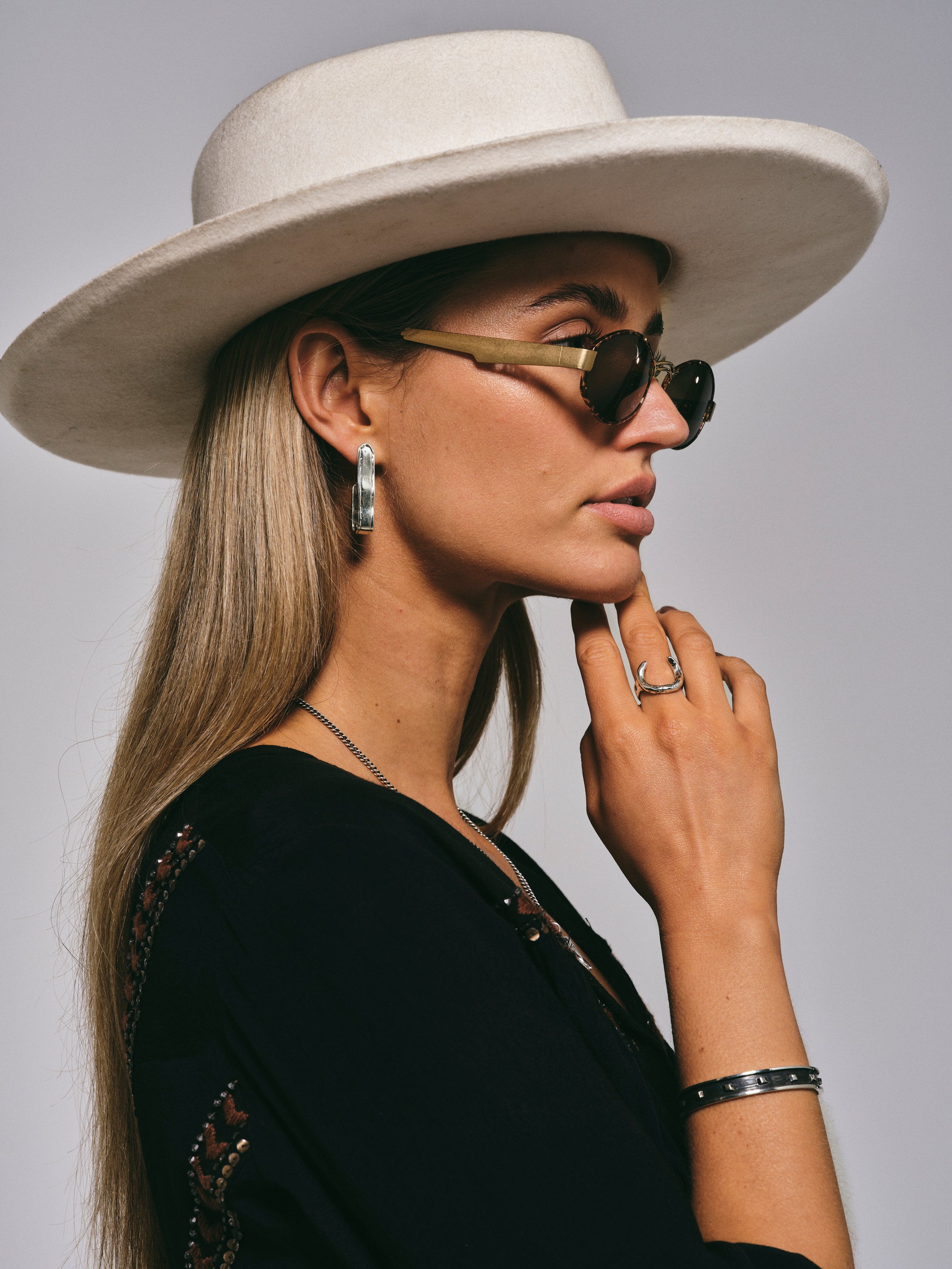 Nailed Belt Earrings in Silver