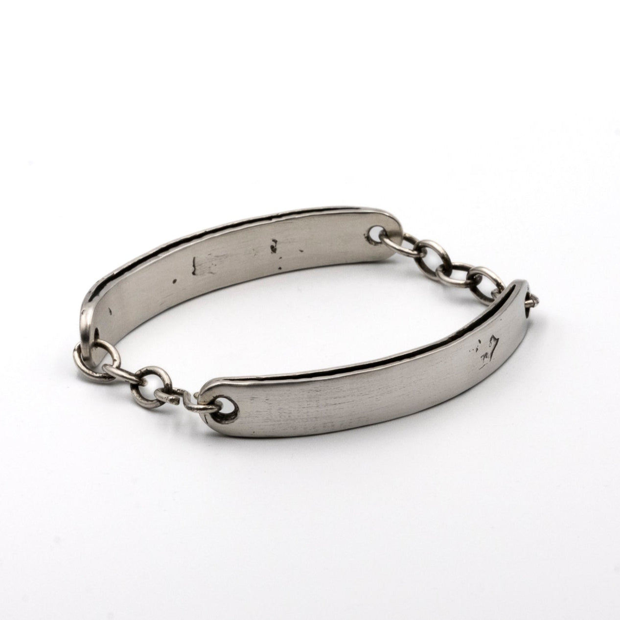 Silver bracelet on a white background