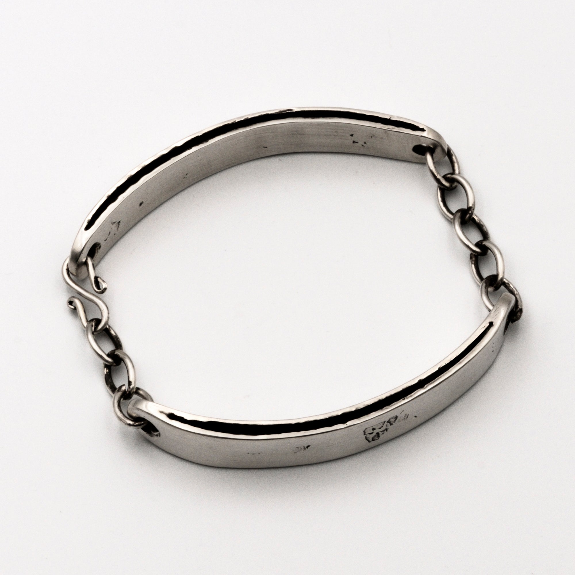 Silver bracelet on a white background